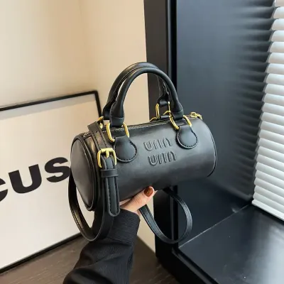 CYLINDRICAL MESSENGER BAG